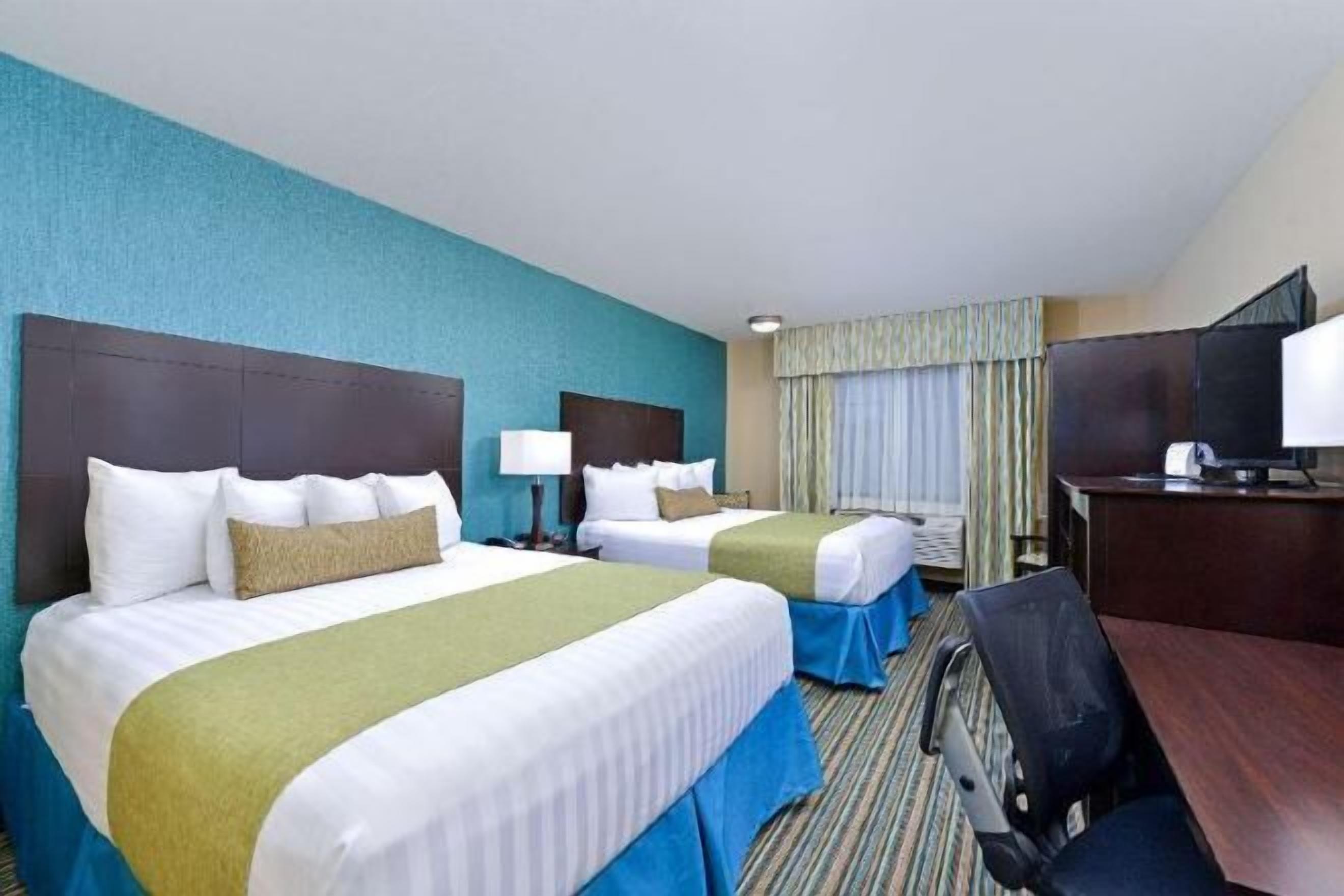 Premium bedding, down comforters, pillowtop beds, individually decorated
