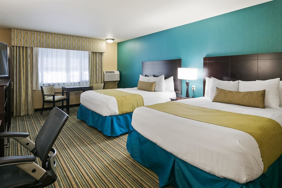 standard room, 2 queen beds, non smoking, refrigerator & microwave | premium bedding, down duvets, pillow-top beds, individually decorated