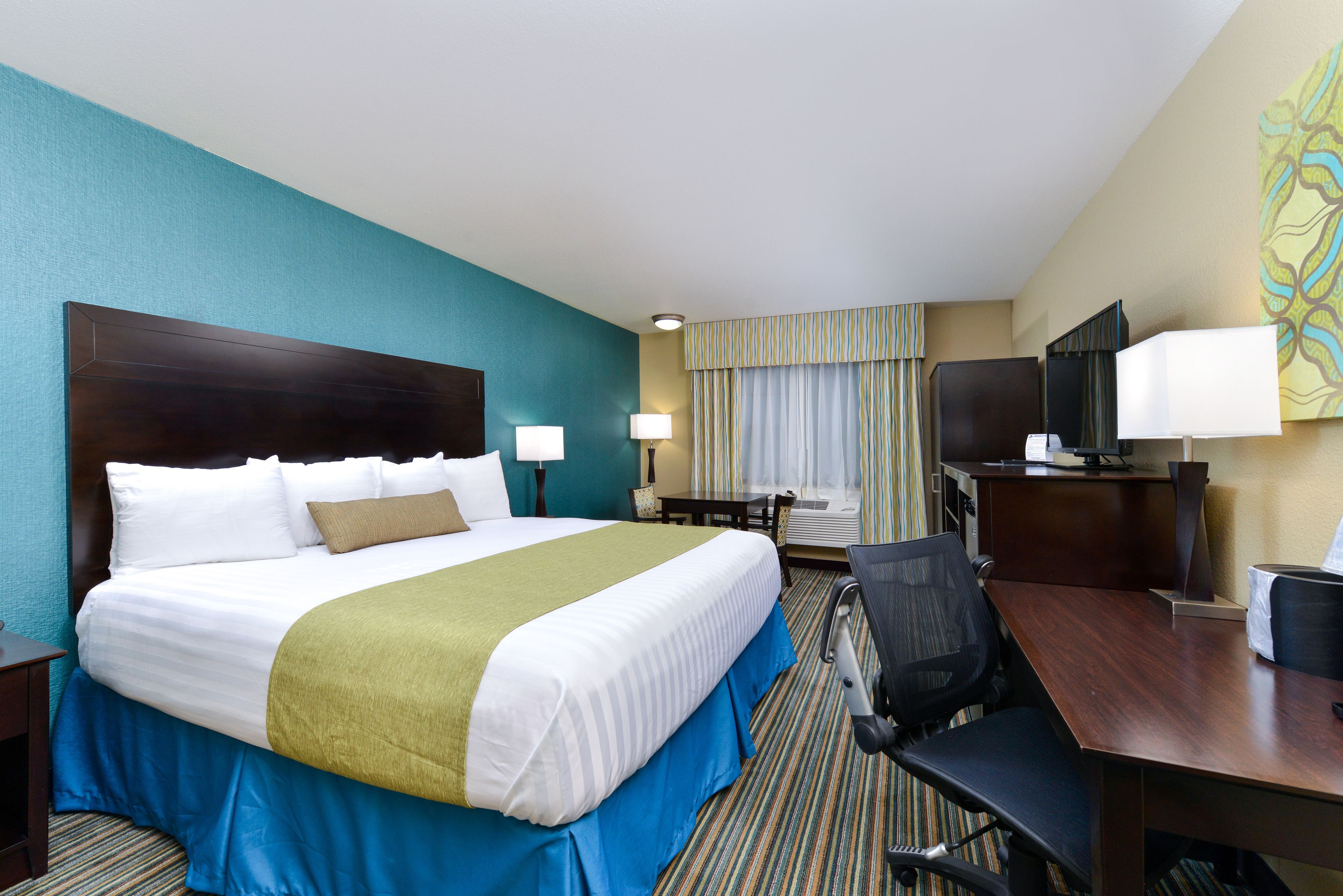 standard room, 1 king bed, non smoking, refrigerator & microwave | premium bedding, down duvets, pillow-top beds, individually decorated