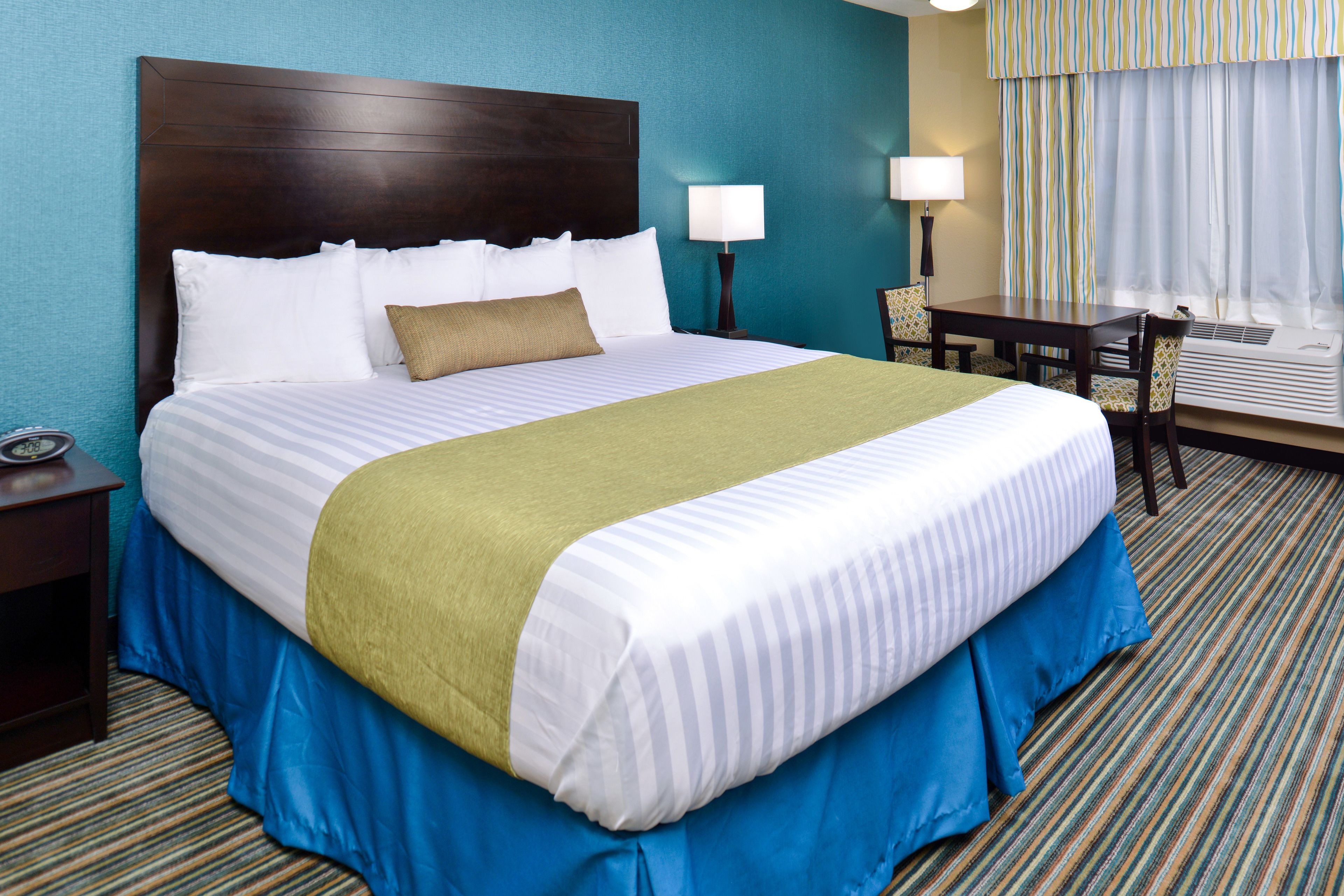 standard room, 1 king bed, non smoking, refrigerator & microwave | premium bedding, down duvets, pillow-top beds, individually decorated