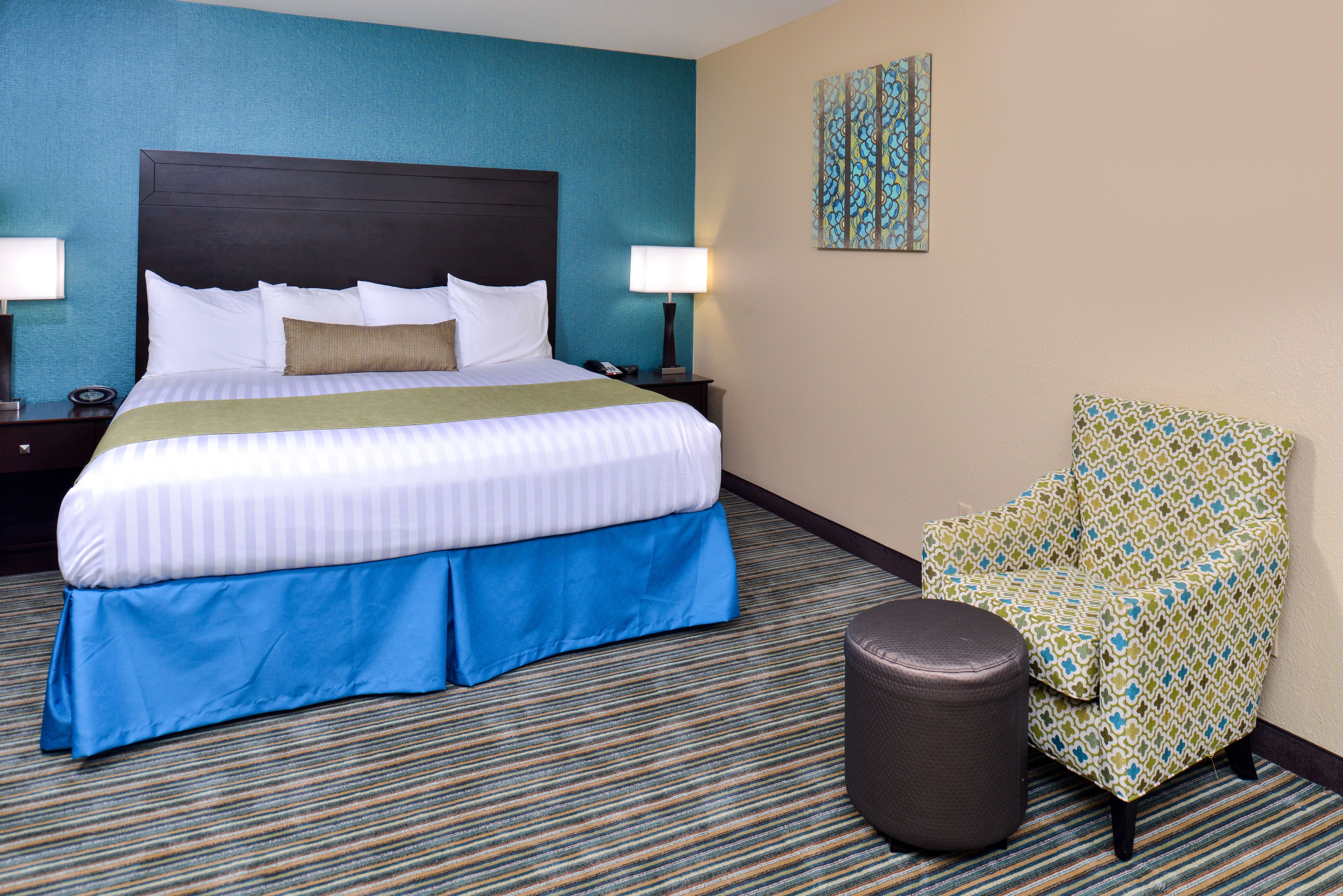 suite, 1 king bed, non smoking, refrigerator & microwave | premium bedding, down duvets, pillow-top beds, individually decorated