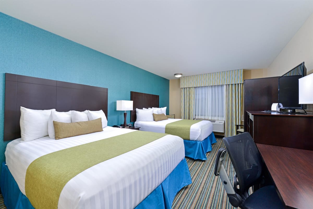 standard room, 2 queen beds, non smoking, refrigerator & microwave | premium bedding, down duvets, pillow-top beds, individually decorated