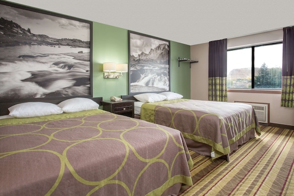 In-room safe, blackout drapes, WiFi (free), alarm clocks