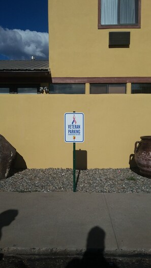 Designated parking area for veterans is conveniently located near the building entrance.