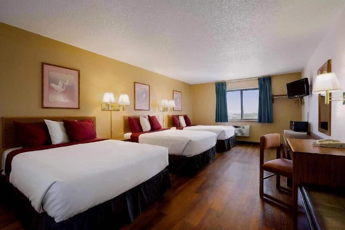 Desk, laptop workspace, iron/ironing board, cribs/infant beds