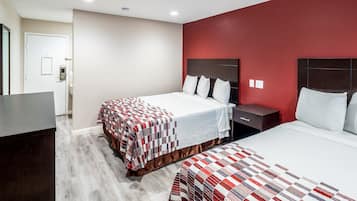 Pillow-top beds, desk, blackout curtains, iron/ironing board