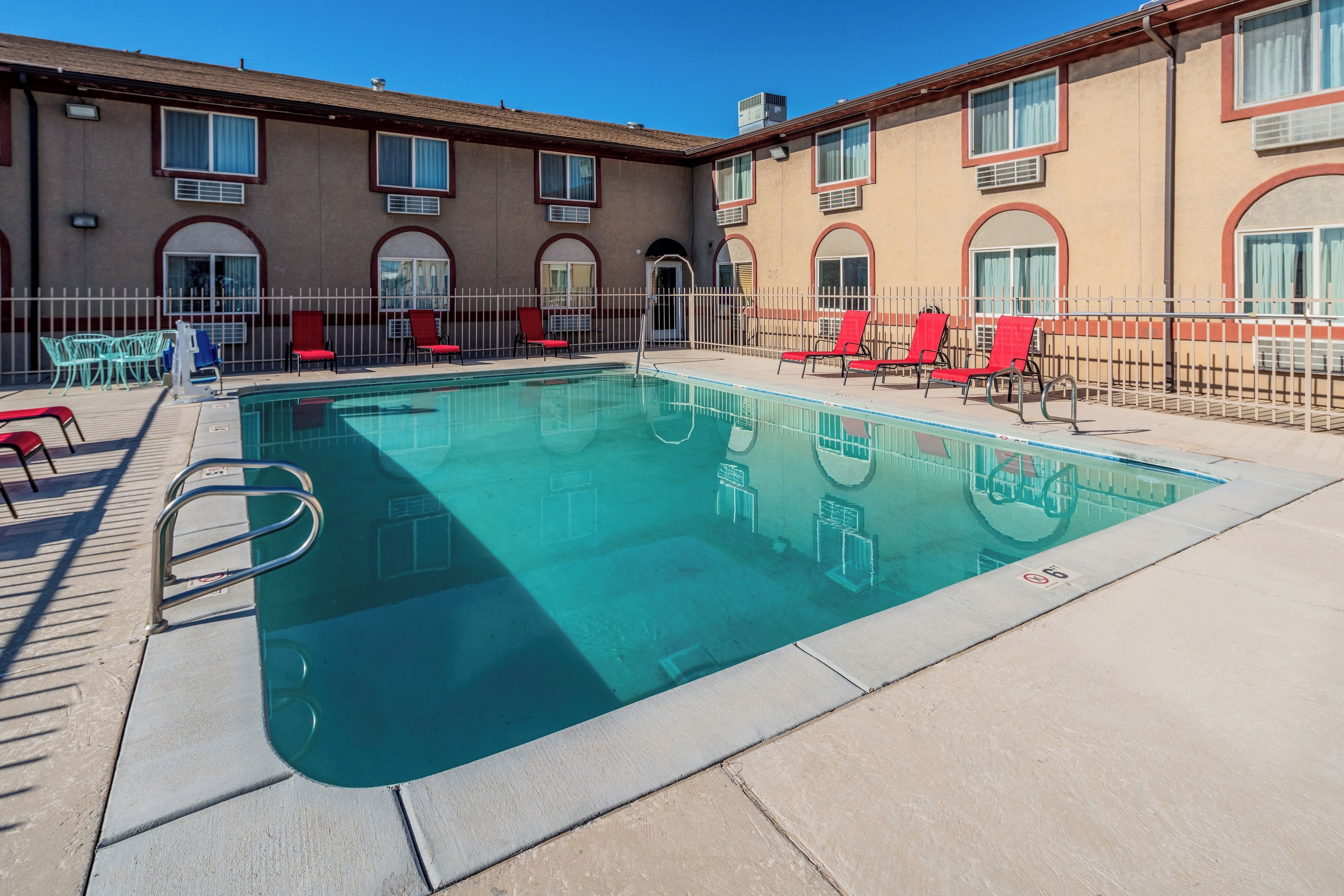 Seasonal outdoor pool, open 10:00 AM to 9:00 PM, pool umbrellas