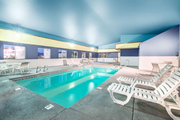 Indoor pool, open 6:00 AM to 11 PM, pool loungers