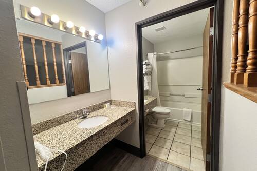 Deluxe Room, 2 Queen Beds, Non Smoking | Bathroom | Free toiletries, hair dryer, towels, soap