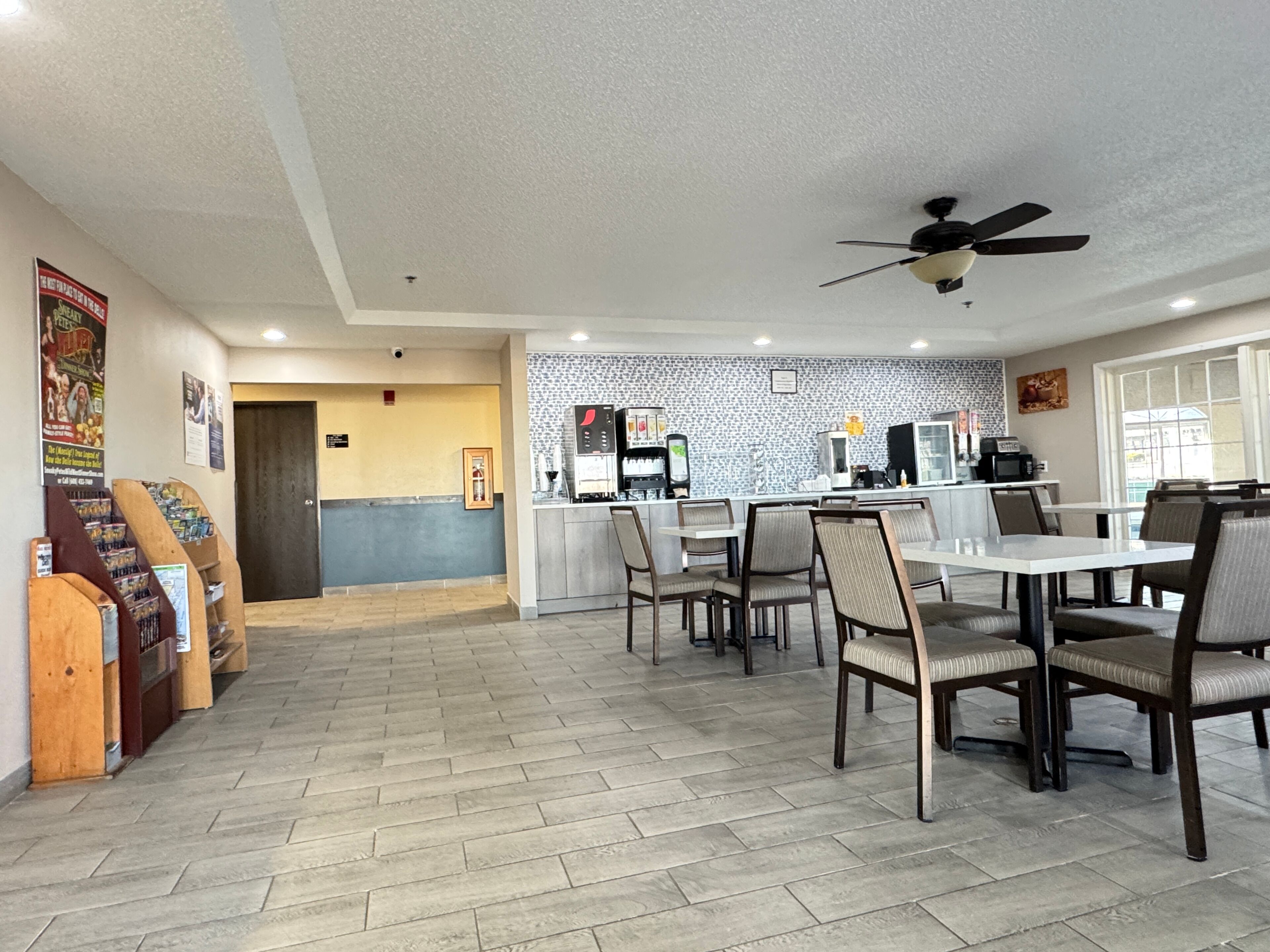 A spacious dining area with a counter and seating.