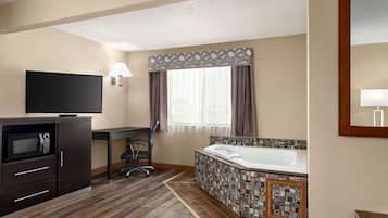 Desk, blackout drapes, iron/ironing board, free cribs/infant beds