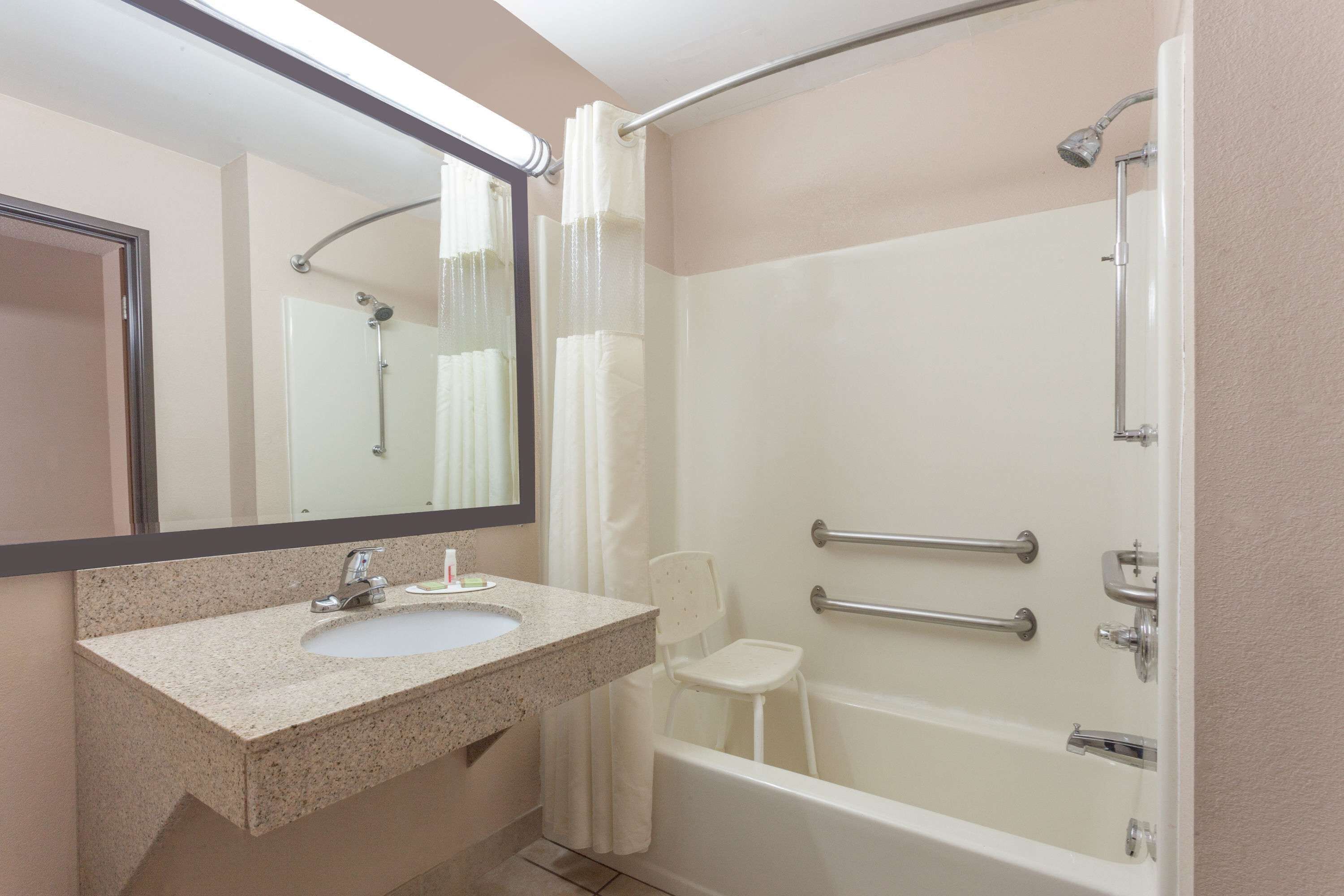 Combined shower/tub, hair dryer, towels, soap