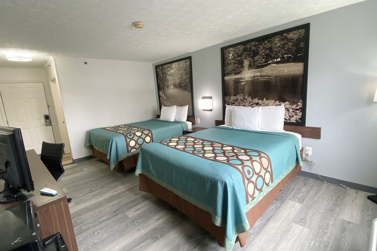 standard room, 2 queen beds, non smoking | in-room safe, iron/ironing board, free wifi, alarm clocks