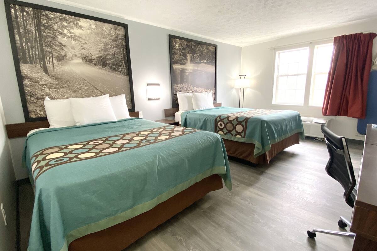 standard room, 2 queen beds, non smoking | in-room safe, iron/ironing board, free wifi, alarm clocks