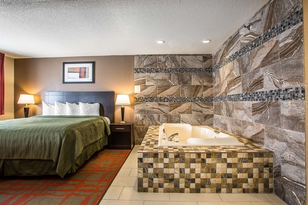 Suite, 1 King Bed, Non Smoking | Iron/ironing board, free cribs/infant beds, free WiFi, bed sheets