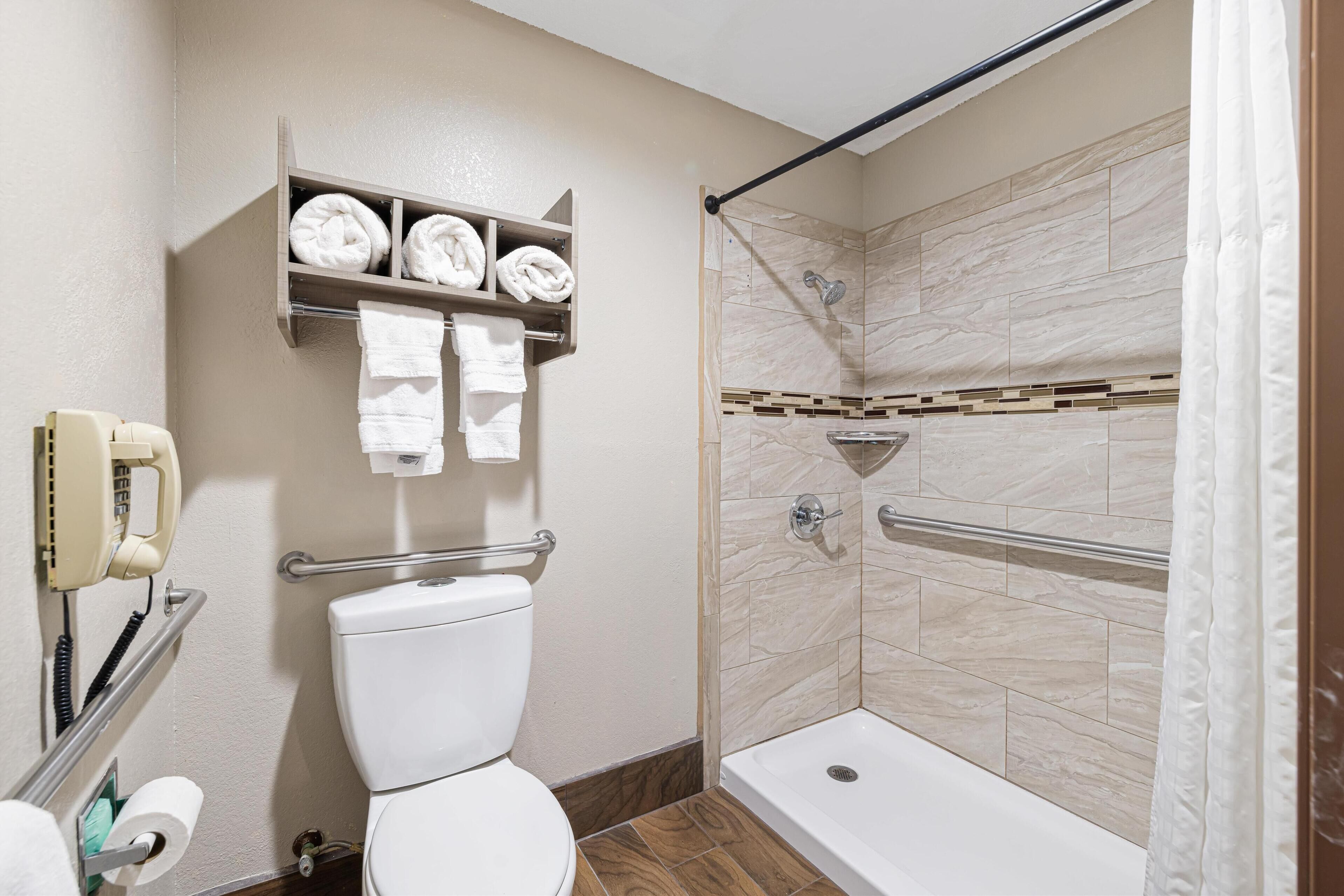 standard room, 1 king bed, accessible, non smoking (walk-in shower) | bathroom | free toiletries, hair dryer, towels, soap