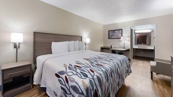 Superior-huone, 1 suuri parisänky (Smoke Free) | Ylelliset vuodevaatteet, pillowtop-patjalliset sängyt, työpöytä