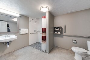 Standard Room, 1 King Bed, Accessible (Roll-In Shower/Smoke Free) | Bathroom | Free toiletries, hair dryer, towels, soap