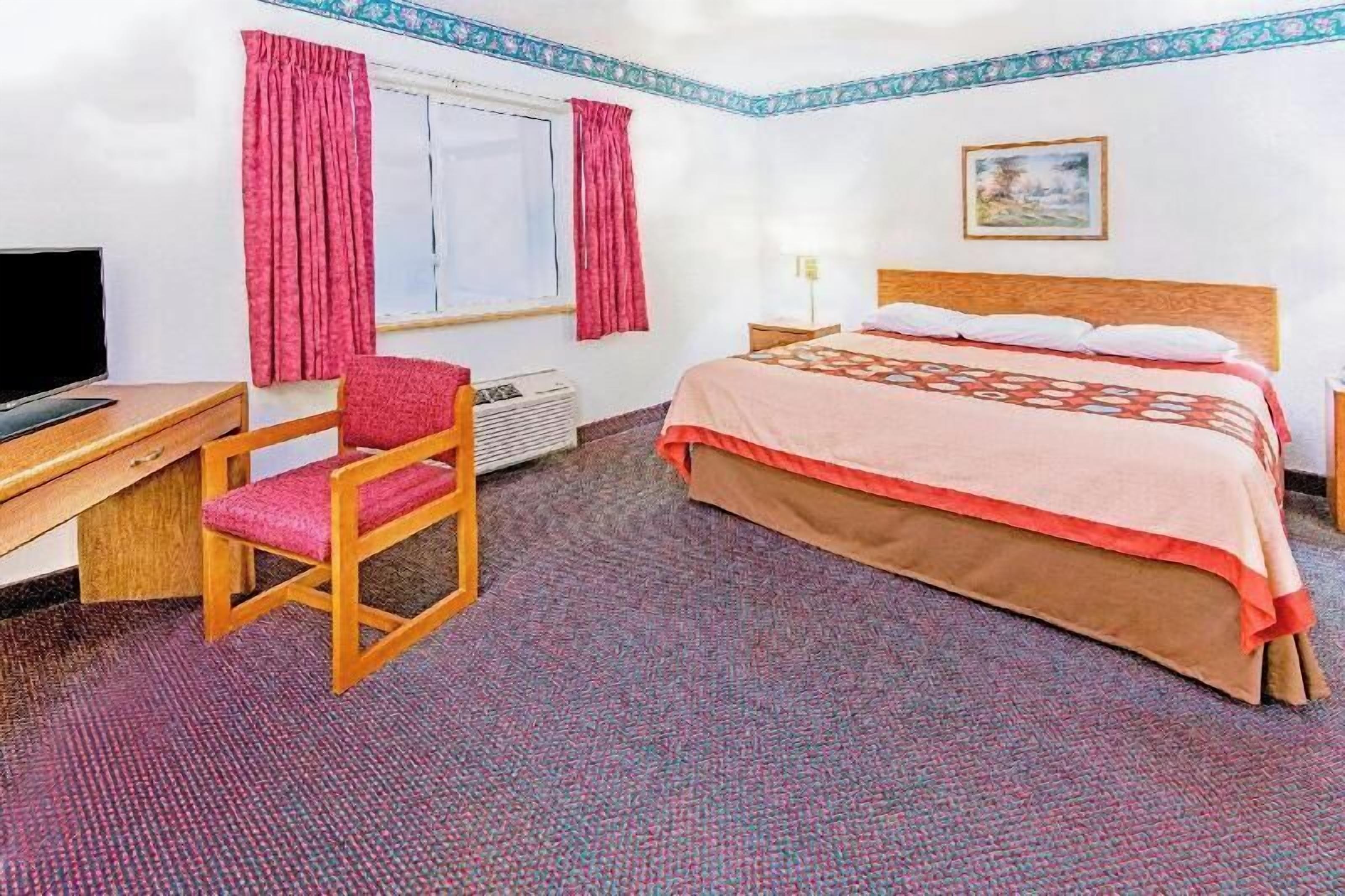 2 bedrooms, desk, blackout curtains, iron/ironing board