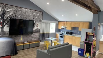 Suite, Multiple Beds, Non Smoking | Desk, blackout drapes, iron/ironing board, free cribs/infant beds