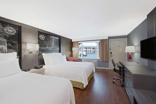 Desk, blackout drapes, iron/ironing board, bed sheets