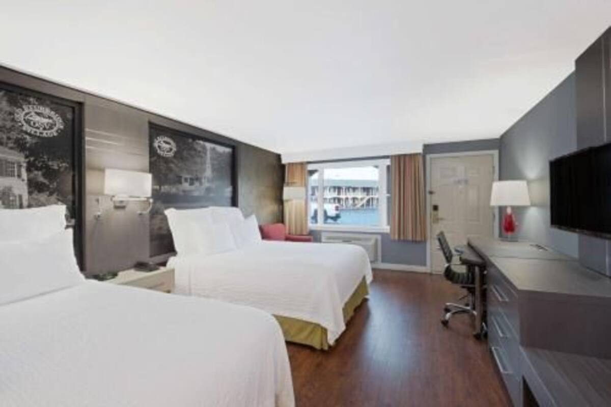 Desk, blackout drapes, iron/ironing board, bed sheets