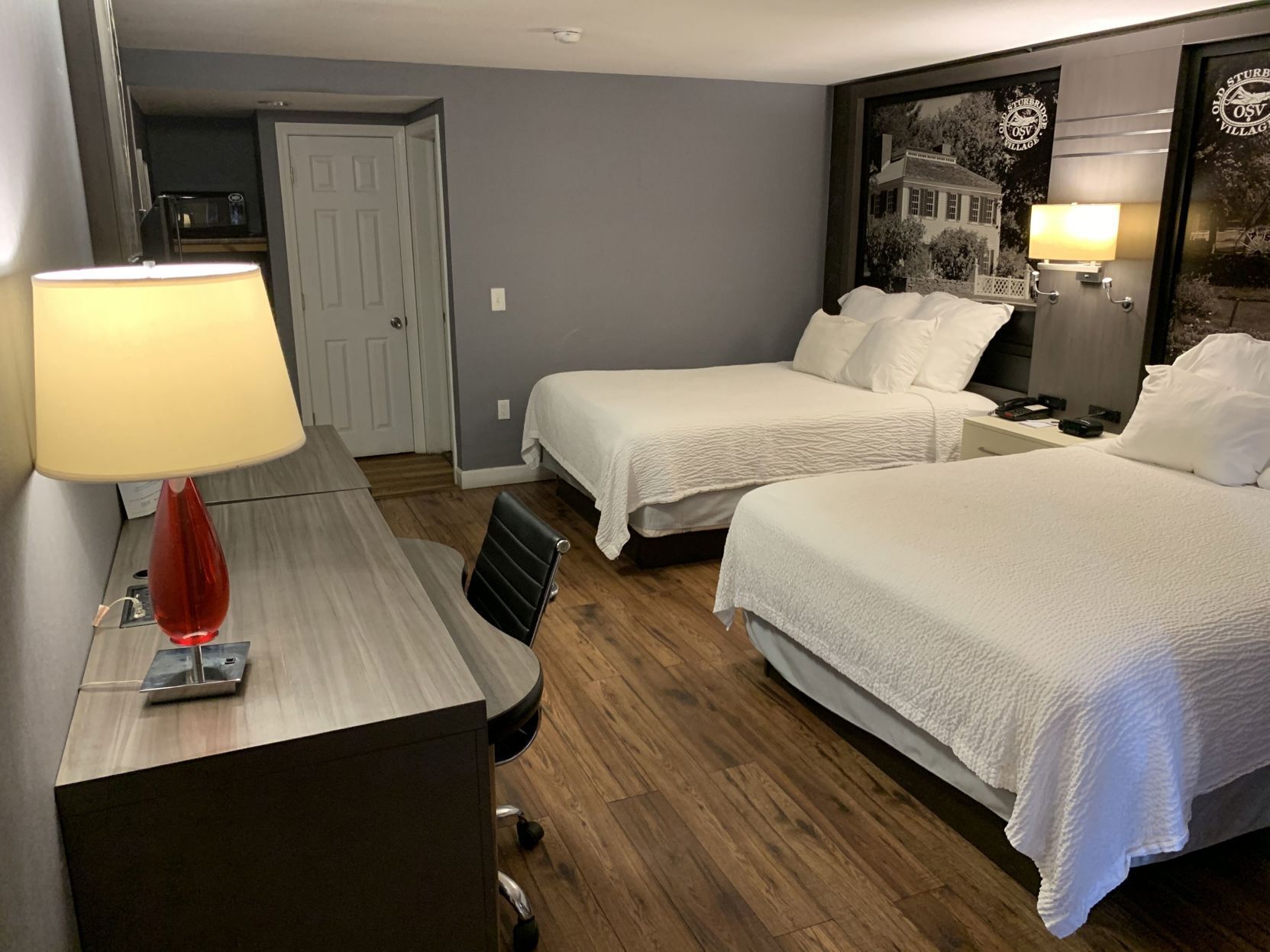 Desk, blackout drapes, iron/ironing board, bed sheets