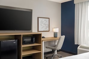 Suite, 1 Bedroom | Living area | TV