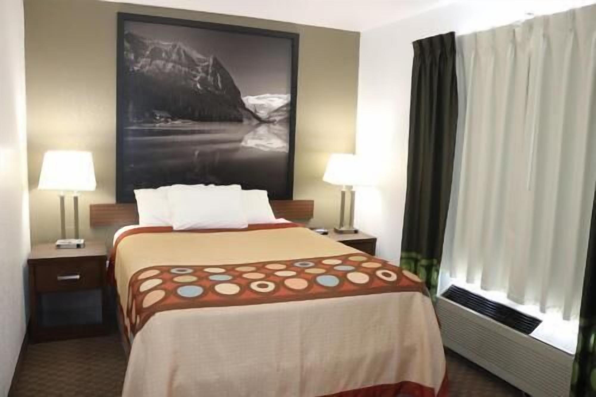 Pillow-top beds, desk, laptop workspace, blackout curtains