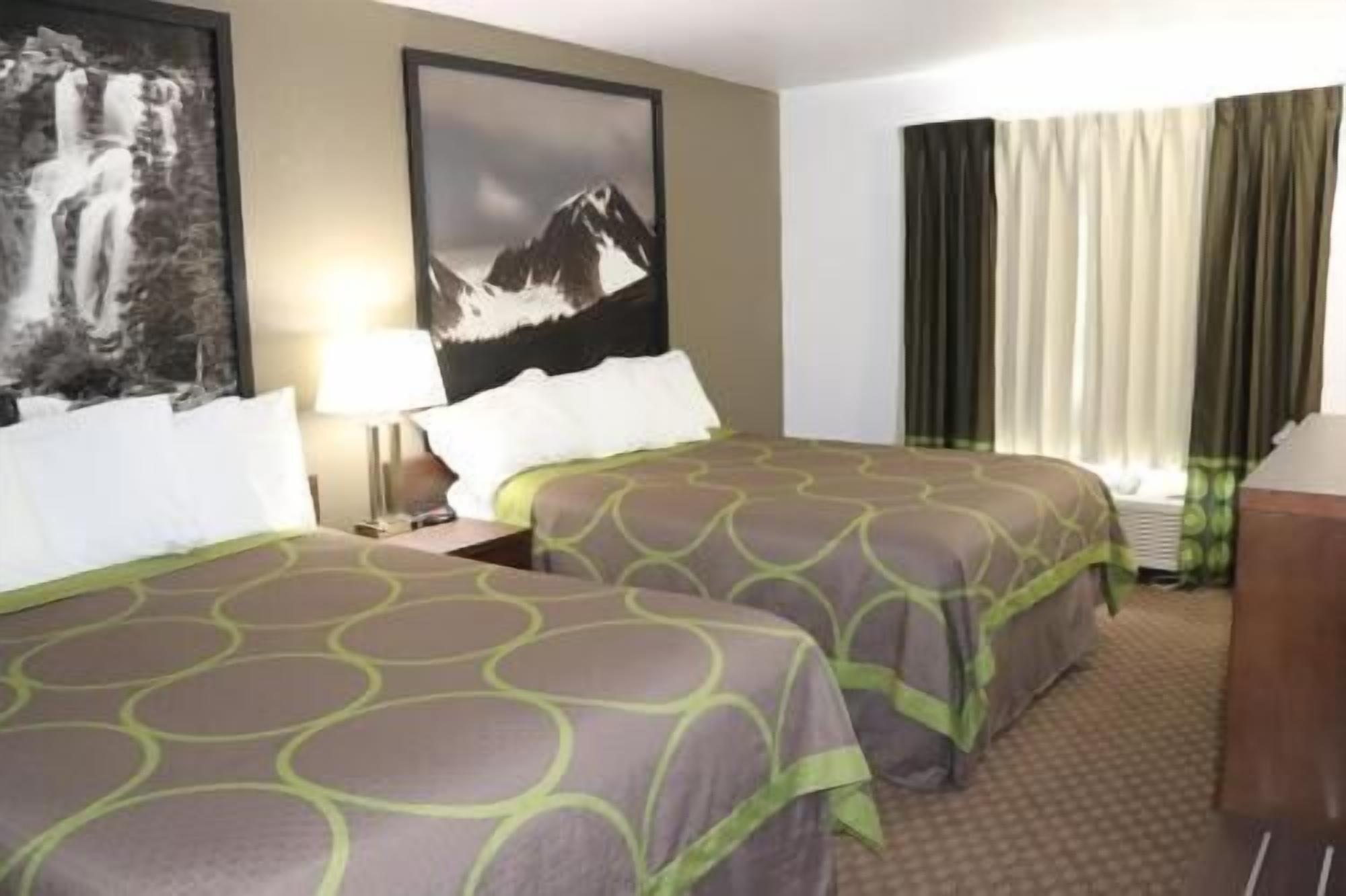 Pillowtop beds, desk, laptop workspace, blackout drapes
