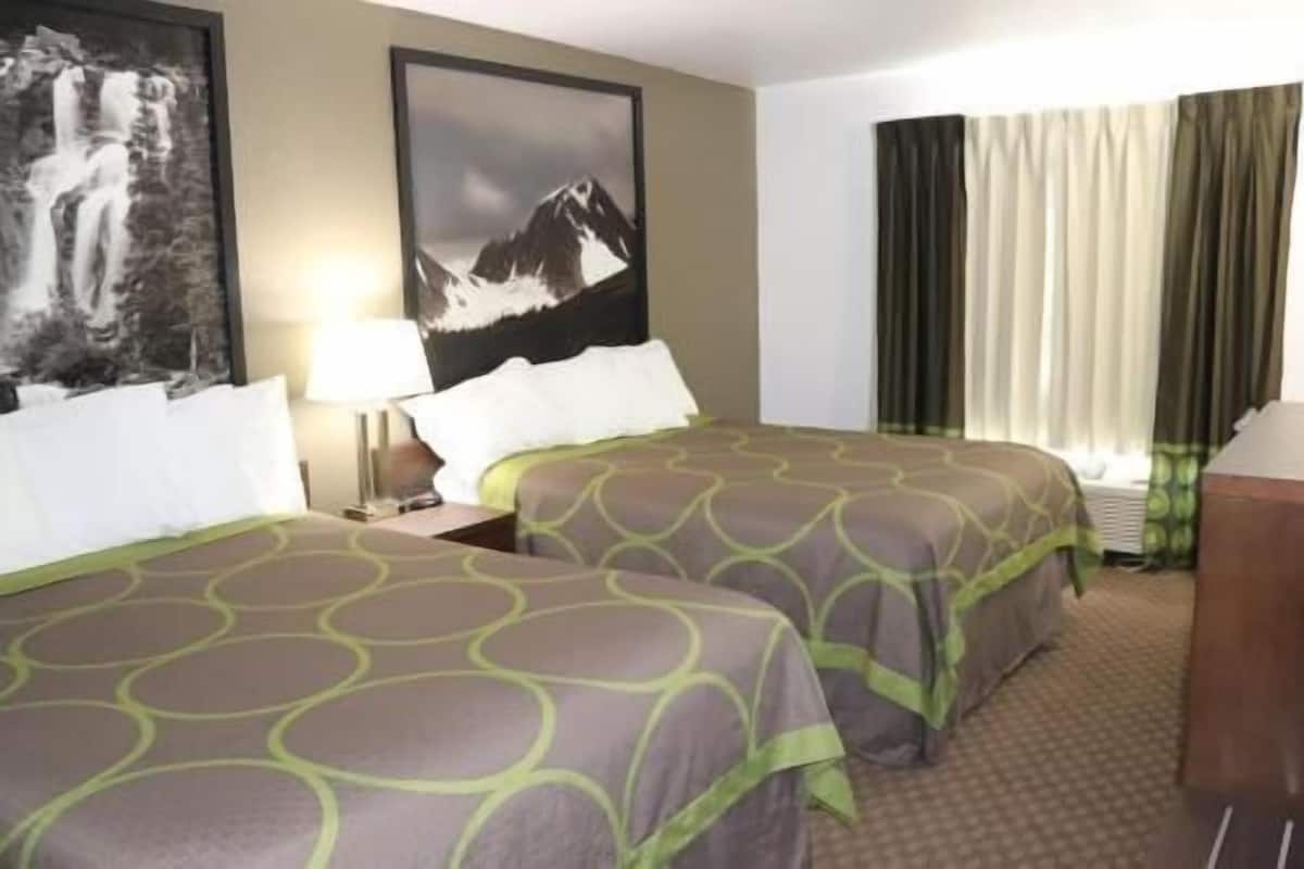 Pillow-top beds, desk, laptop workspace, blackout curtains