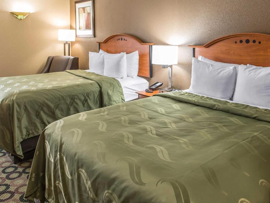 Pillowtop beds, desk, laptop workspace, blackout drapes