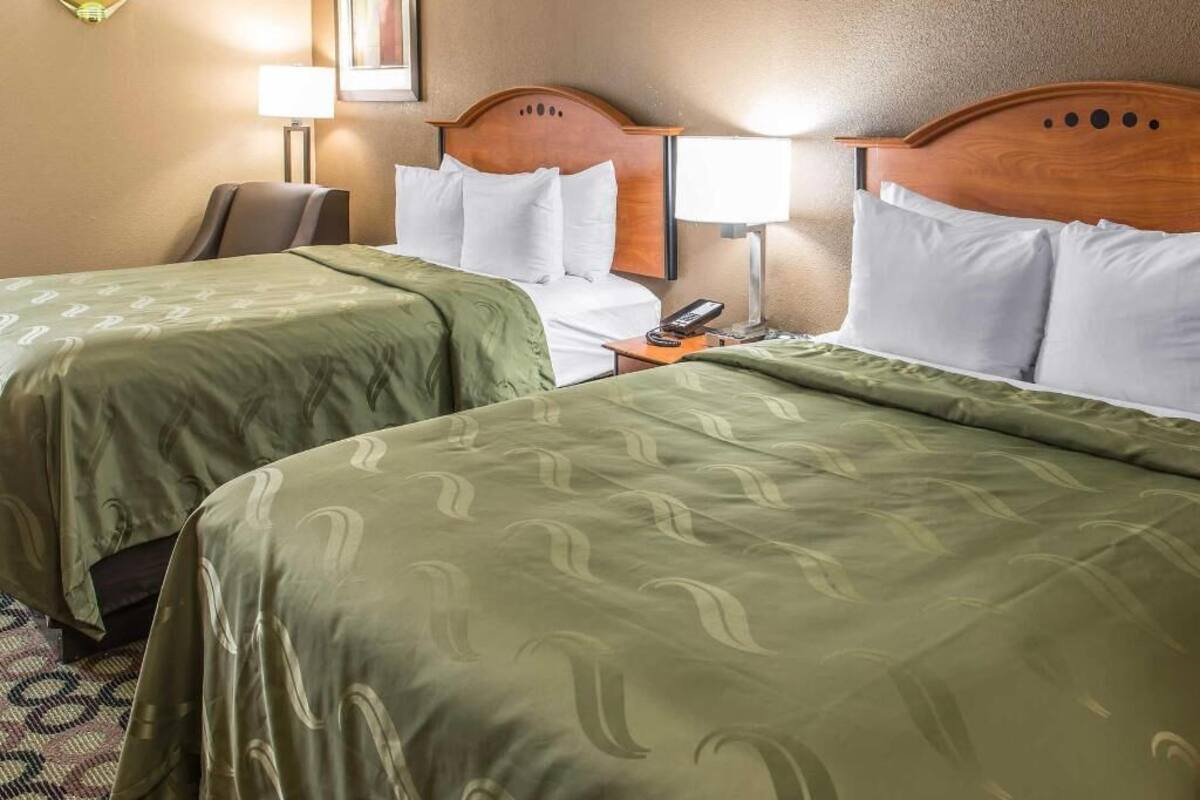 Pillowtop beds, desk, laptop workspace, blackout drapes