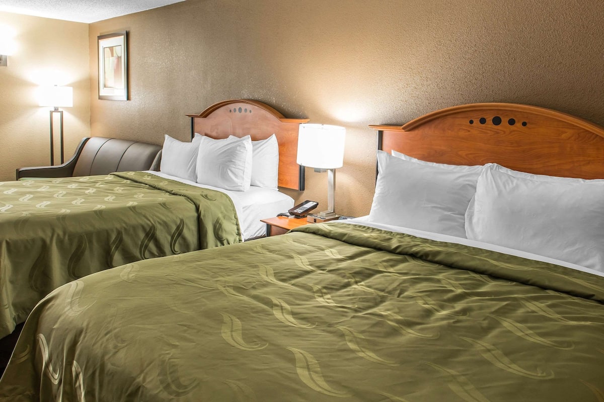 Pillow-top beds, desk, laptop workspace, blackout curtains