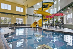 Indoor pool, open 9:00 AM to 9:00 PM, pool loungers