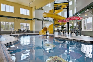 Indoor pool, open 9:00 AM to 9:00 PM, pool loungers