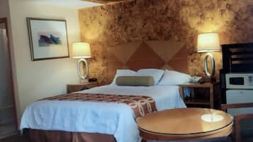 Room, 1 King Bed, Non Smoking | 1 bedroom, desk, free WiFi, bed sheets
