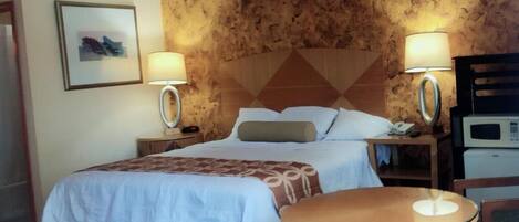 Room, 1 King Bed, Non Smoking | 1 bedroom, desk, free WiFi, bed sheets