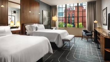 Premium bedding, down comforters, pillowtop beds, in-room safe