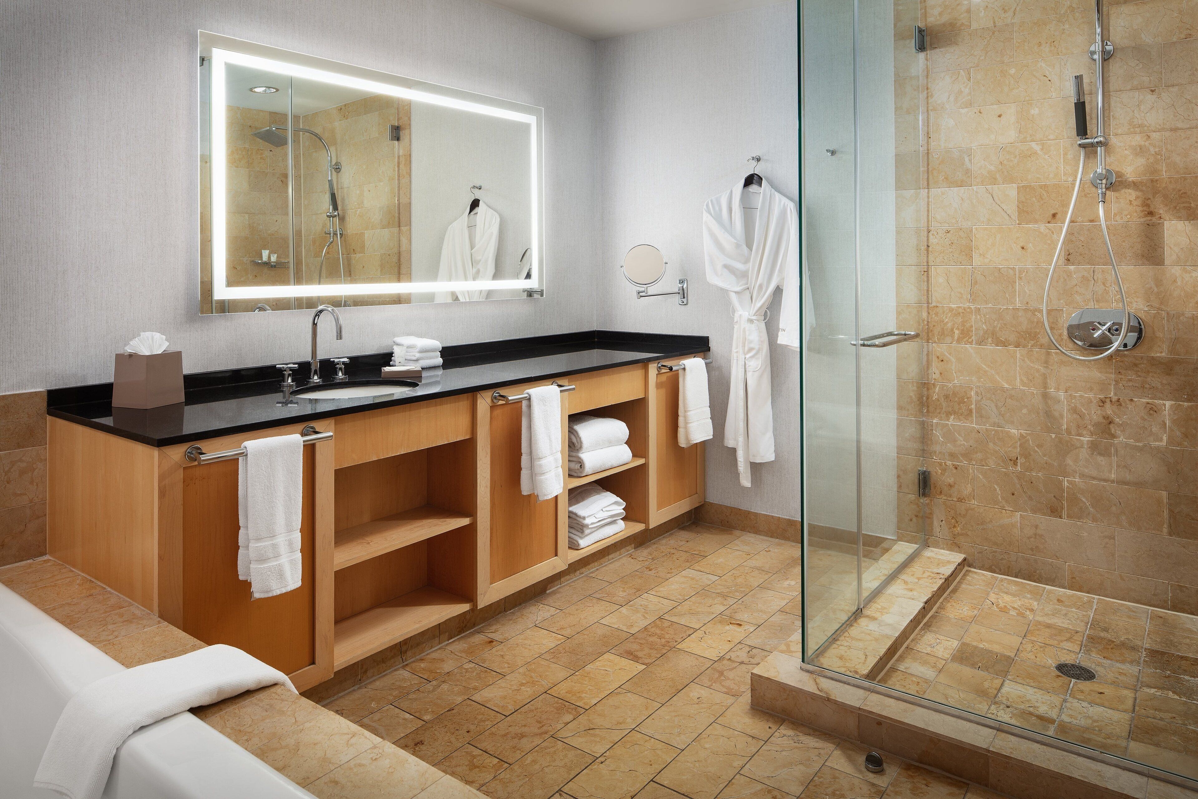separate bathtub and shower, deep-soaking bathtub, designer toiletries