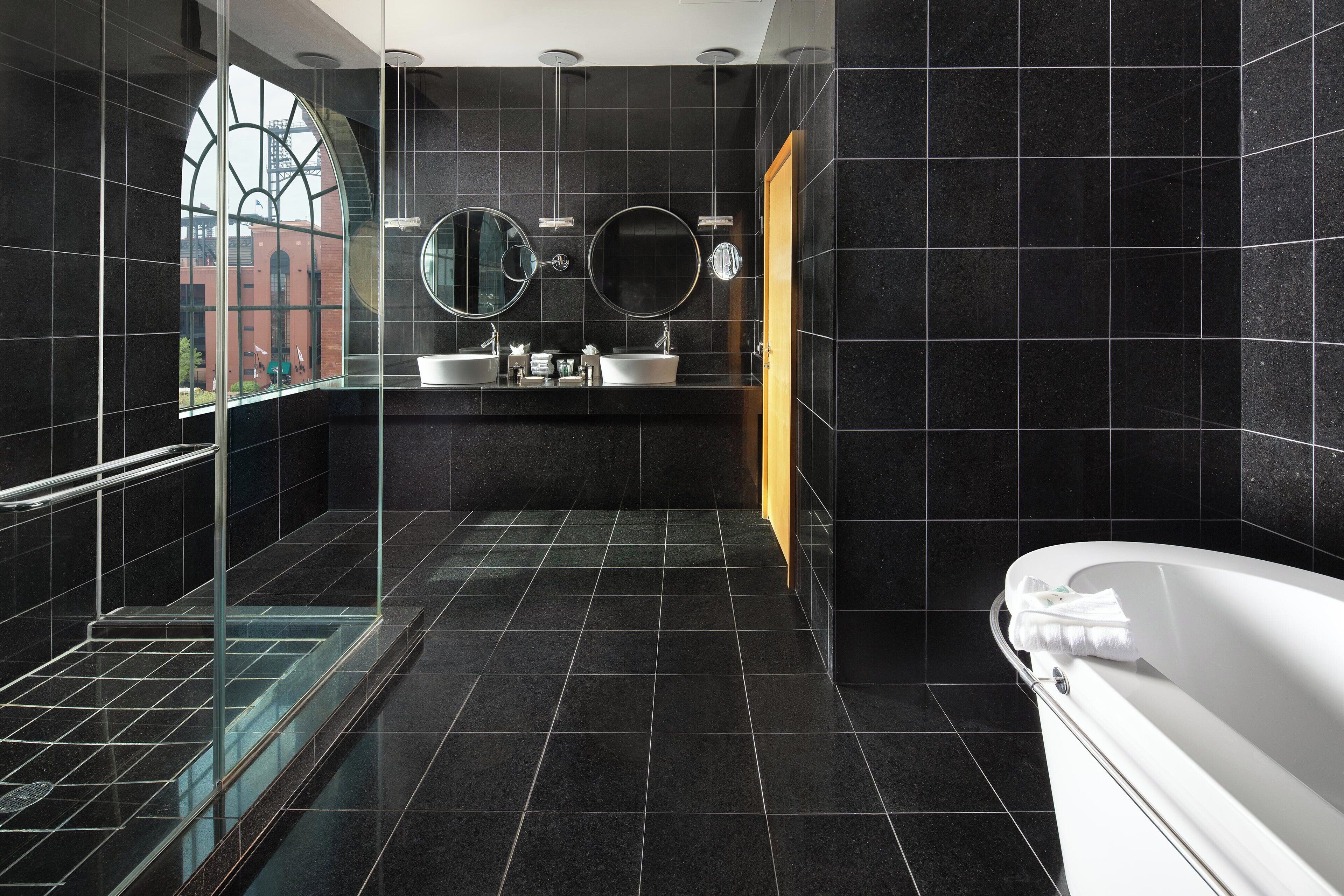 separate bathtub and shower, deep-soaking bathtub, designer toiletries