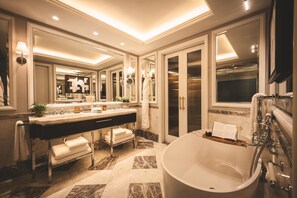Designer toiletries, hair dryer, bathrobes, slippers