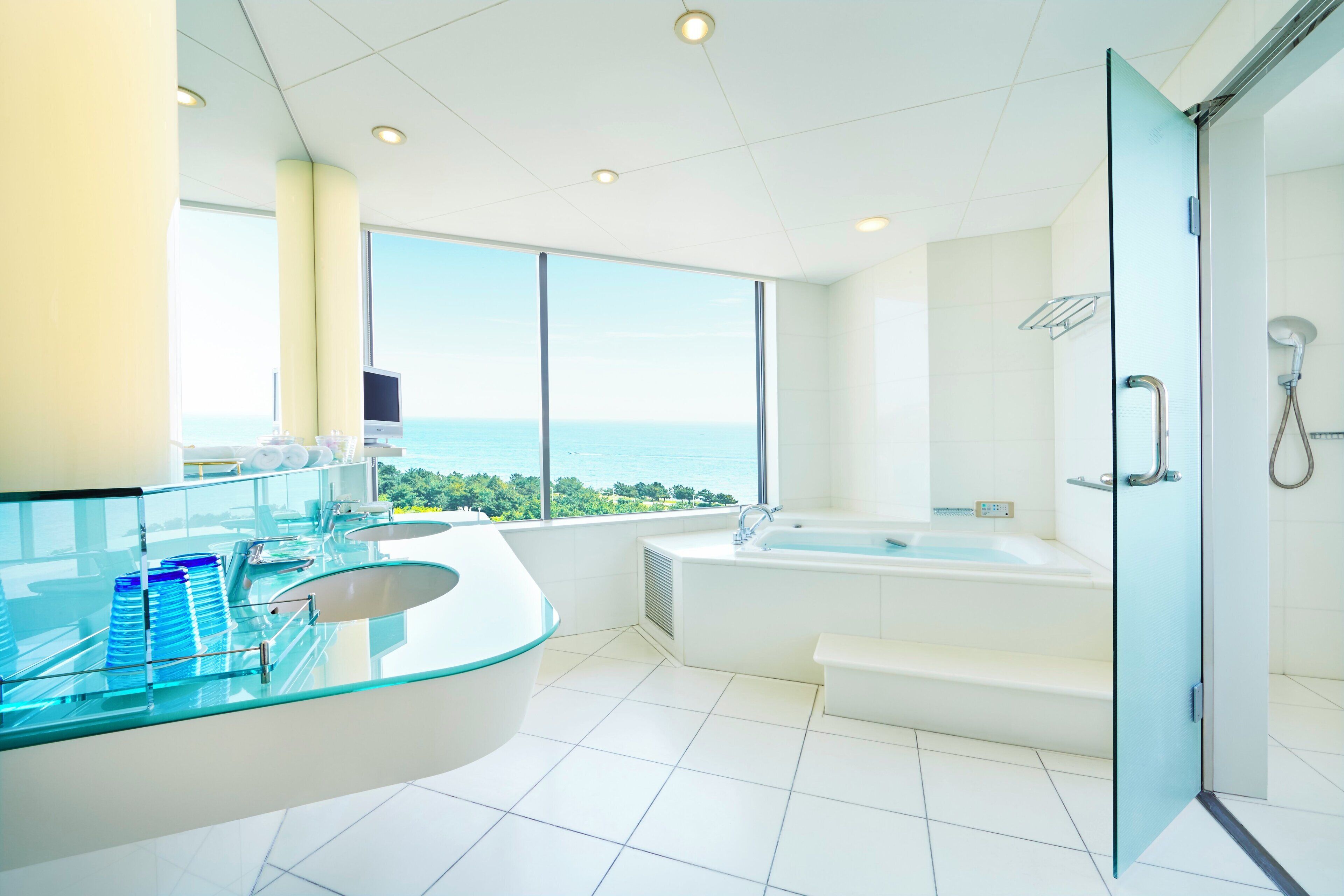 separate bathtub and shower, free toiletries, hair dryer, slippers