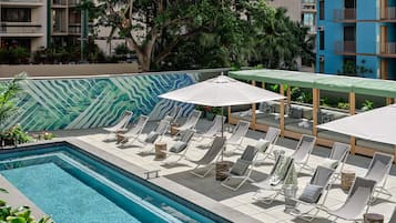 Outdoor pool, open 8:00 AM to 10:00 PM, cabanas (surcharge)