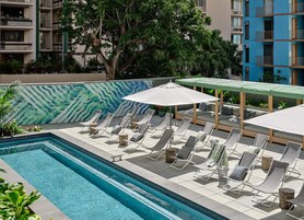 Outdoor pool, open 8:00 AM to 10:00 PM, cabanas (surcharge)