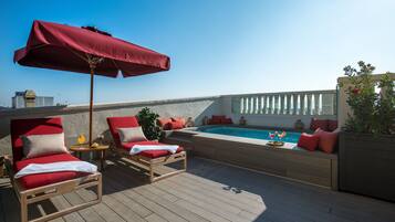 Seasonal outdoor pool, pool umbrellas, pool loungers