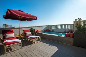 Seasonal outdoor pool, pool umbrellas, pool loungers