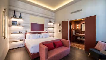 Premium bedding, down comforters, minibar, in-room safe