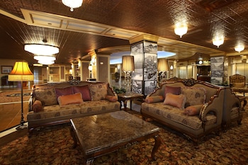Sitting area in hotel lobby at The Claridge Hotel