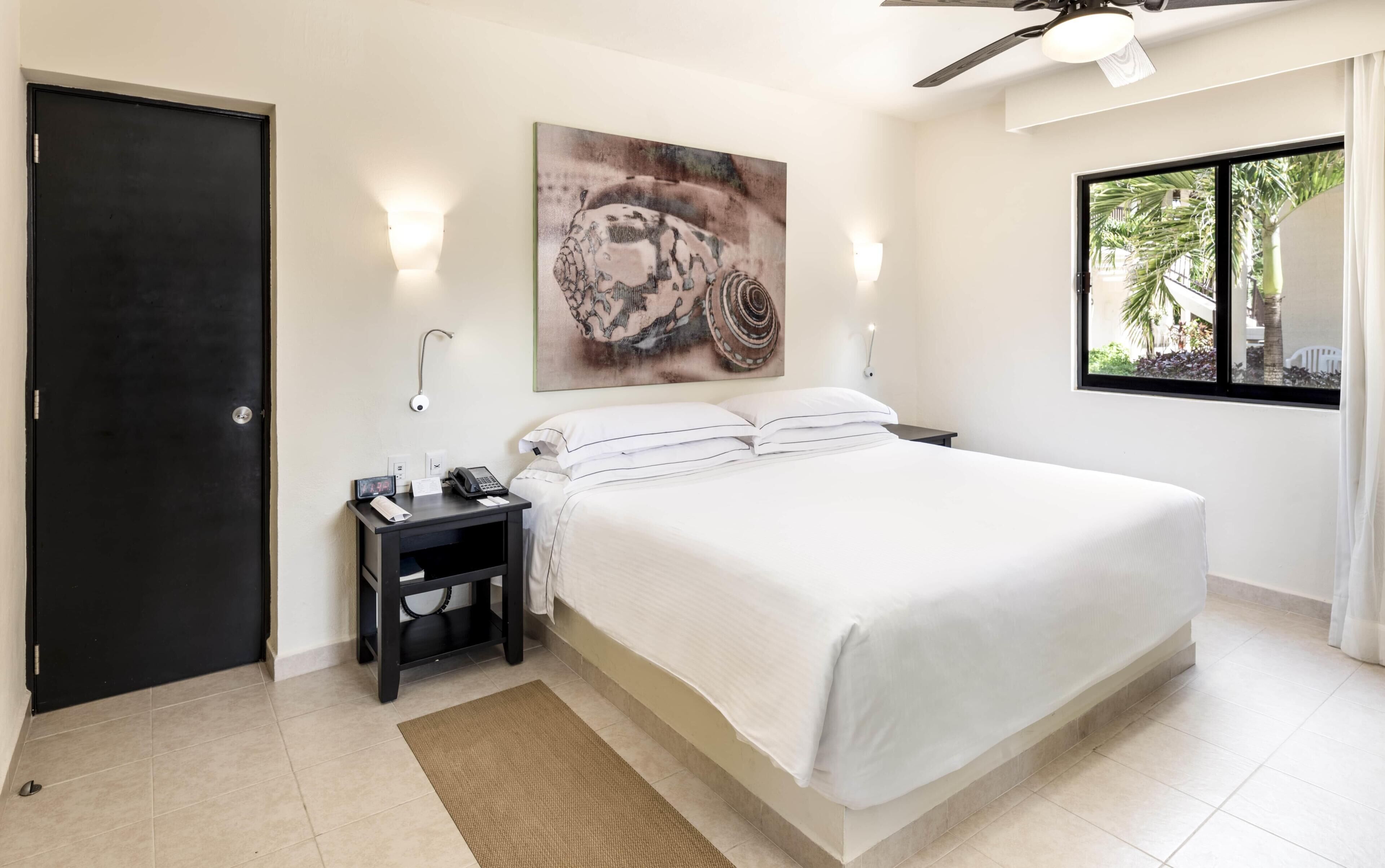Family Room, Garden View | Free minibar, in-room safe, blackout drapes, iron/ironing board